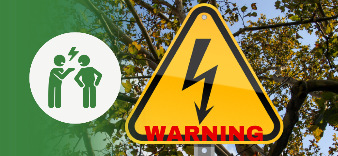 Visual of a warning sign with a lightning bolt and the word “WARNING” in red, overlaid with an icon of two people arguing on a green gradient background, representing workplace conflict and potential escalation.