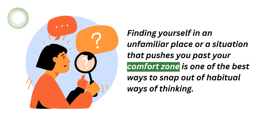 Cartoon-style illustration of a woman holding a magnifying glass with a question mark above her head. Around her are speech bubbles with more question marks, representing confusion or exploration. Next to the image is text: “Finding yourself in an unfamiliar place or a situation that pushes you past your comfort zone is one of the best ways to snap out of habitual ways of thinking.”