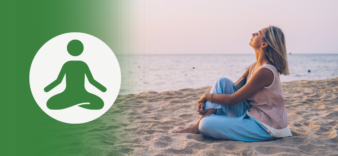 Woman sitting cross-legged on a beach at sunrise or sunset, looking peaceful and reflective, with a meditation icon overlaid on a green gradient to the left side of the image.